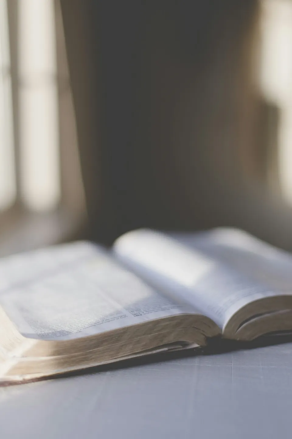 An open Bible on a table